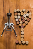 Cork Puller With Corks Arranged As A Bottle